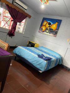 Voodi või voodid majutusasutuse Managua Hotel Oasis toas