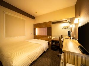 TV a/nebo společenská místnost v ubytování Super Hotel Kochi