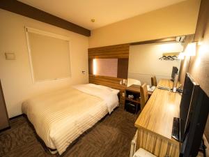 TV a/nebo společenská místnost v ubytování Super Hotel Kochi