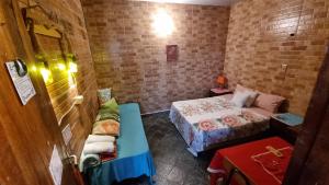Postelja oz. postelje v sobi nastanitve Hostal Jardín de Luque