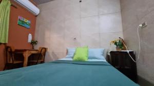 Postelja oz. postelje v sobi nastanitve Hostal Jardín de Luque