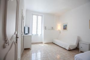 Postel nebo postele na pokoji v ubytování Appartements Foch