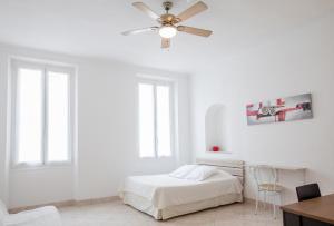 Postel nebo postele na pokoji v ubytování Appartements Foch