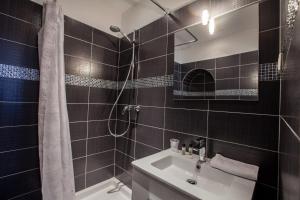 Koupelna v ubytování Appartements Foch
