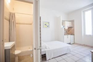 Koupelna v ubytování Appartements Foch