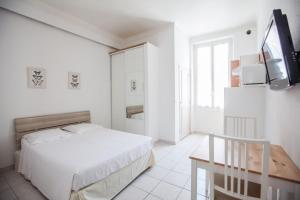 Postel nebo postele na pokoji v ubytování Appartements Foch