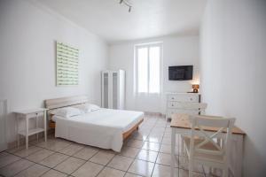Postel nebo postele na pokoji v ubytování Appartements Foch