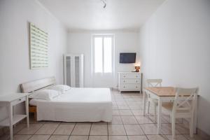 Postel nebo postele na pokoji v ubytování Appartements Foch