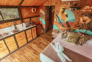 a model of a room with a bedroom and a kitchen at La Finca De Frida in Guatapé