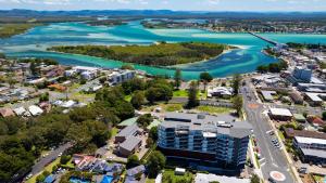 an aerial view of a city and the river at Serenity at Solaris 101 in Forster