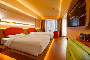 Postelja oz. postelje v sobi nastanitve Super Time Trendy Design Hotel Guangzhou Beijing Road Pedestrian Street Dafo Temple Branch