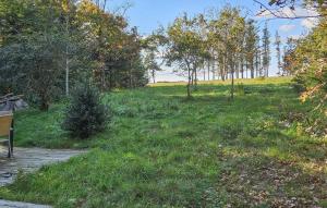 Taman di luar Three-Bedroom Holiday Home In Spottrup +12 gambar
