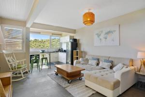 Posezení v ubytování Appartement Naïa, avec piscine commune