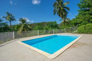 Bazén v ubytování Appartement Naïa, avec piscine commune nebo v jeho okolí
