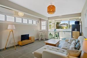 Posezení v ubytování Appartement Naïa, avec piscine commune
