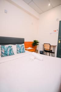 Posezení v ubytování Swing & Pillows - 75 Chulia St, Georgetown Penang