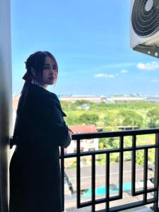 Balkón nebo terasa v ubytování เวลโกรว์ โฮเทล - Wellgrow Hotel