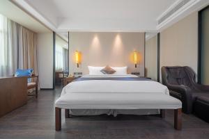Xiamen Minyi International Hotel客房内的一张或多张床位