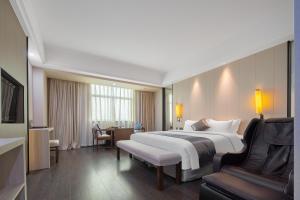 Xiamen Minyi International Hotel客房内的一张或多张床位