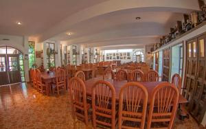 Ein Restaurant oder anderes Speiselokal in der Unterkunft Hotel Hacienda Xico Inn 