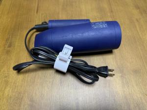 a blue device sitting on top of a table at The house of calmness in Beppu