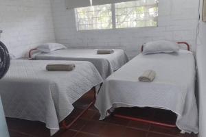 Ένα ή περισσότερα κρεβάτια σε δωμάτιο στο Casa Piedras Gordas, Piscina Privada y BBQ
