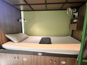 Postel nebo postele na pokoji v ubytování Hanoi EcoStay 2 hostel