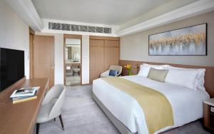 Postelja oz. postelje v sobi nastanitve Hopewell Hotel