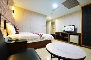 TV a/nebo společenská místnost v ubytování I Hi Loveriver Hotel