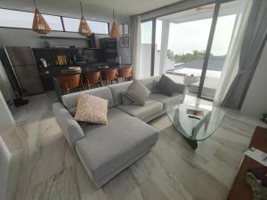 Ruang duduk di Harmony Villa, piscine privée à débordement vue mer !