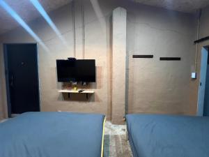 Postel nebo postele na pokoji v ubytování Hidden Life B&B