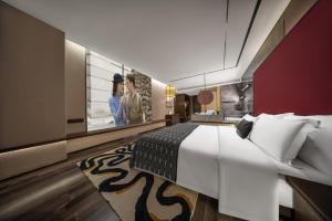 Voodi või voodid majutusasutuse Beso Designer Apartent Hotel toas