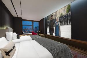 Voodi või voodid majutusasutuse Beso Designer Apartent Hotel toas