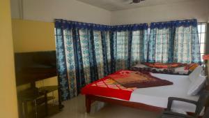 Letto o letti in una camera di Zeeenu Abode Yercaud by GD
