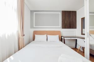Postel nebo postele na pokoji v ubytování Comfort Stay Apartment 1BR at Tuscany Residences By Travelio