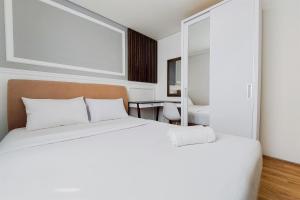 Postel nebo postele na pokoji v ubytování Comfort Stay Apartment 1BR at Tuscany Residences By Travelio