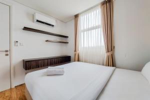 Postel nebo postele na pokoji v ubytování Comfort Stay Apartment 1BR at Tuscany Residences By Travelio