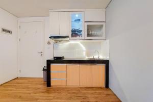 Kuchyň nebo kuchyňský kout v ubytování Comfort Stay Apartment 1BR at Tuscany Residences By Travelio