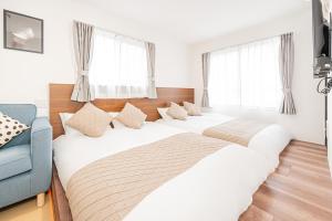 New-built APT at Asakusa-Skytree area with Tranquil block房間的床