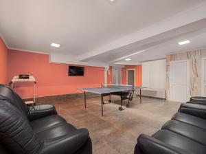 TV a/nebo společenská místnost v ubytování Hotel Paris