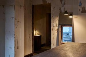 Postel nebo postele na pokoji v ubytování Tou