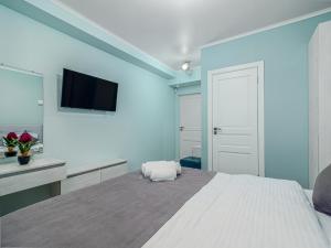 Postel nebo postele na pokoji v ubytování Hotel Paris