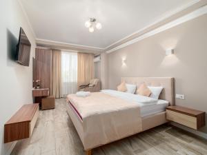 Postel nebo postele na pokoji v ubytování Hotel Paris