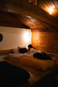 Ένα ή περισσότερα κρεβάτια σε δωμάτιο στο The Bath and Bed Sakuho