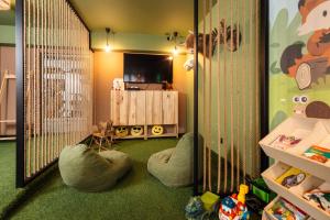 TV a/nebo společenská místnost v ubytování Hotel Podlasie