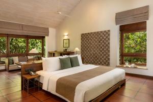 A bed or beds in a room at Jetwing Lagoon Wellness, A Luxury Reserve - Adults Only