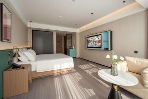 Ένα ή περισσότερα κρεβάτια σε δωμάτιο στο Mehood EZZI Hotel Kaili University South Railway Station