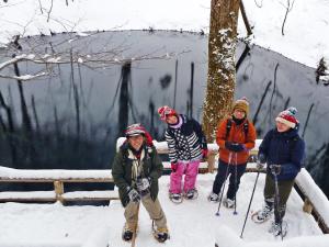 a group of people on skis in the snow at Awone Shirakami Juniko in Fukaura