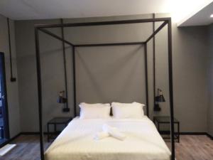 68 Boutique Hotel客房内的一张或多张床位