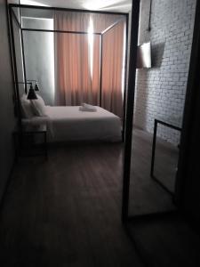 68 Boutique Hotel客房内的一张或多张床位